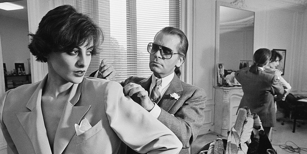 karl-lagerfeld-fits-one-of-his-designs-on-top-model-ines-de-news-photo-627408020-1550583178