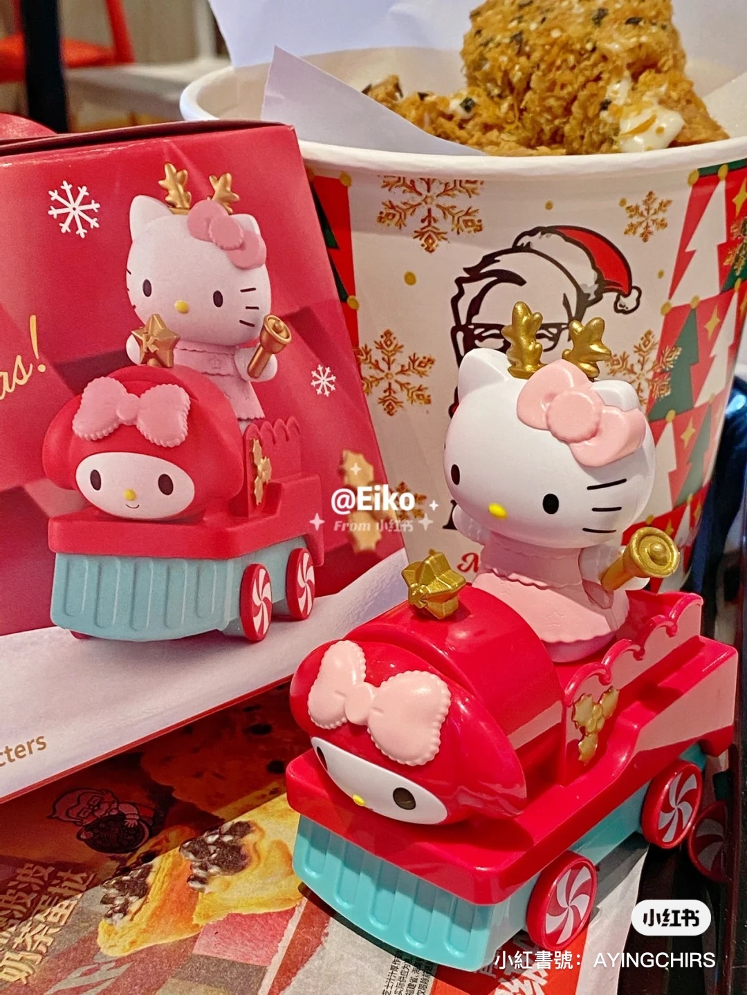 乘駕著美樂蒂火車頭的Kitty列車長火車