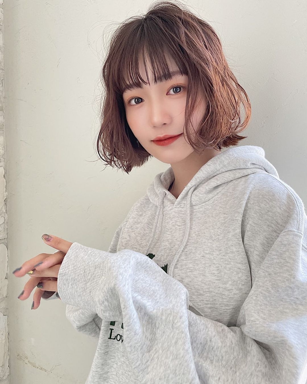 這樣的長度搭配一點捲度也很好看。