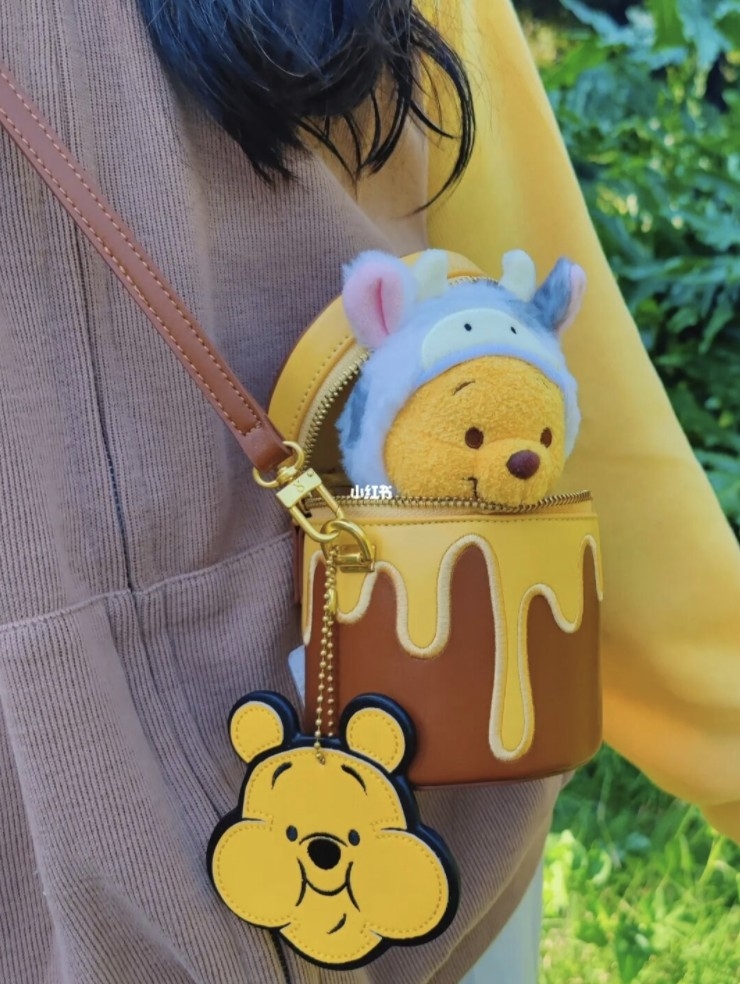 加上維尼玩偶更夢幻