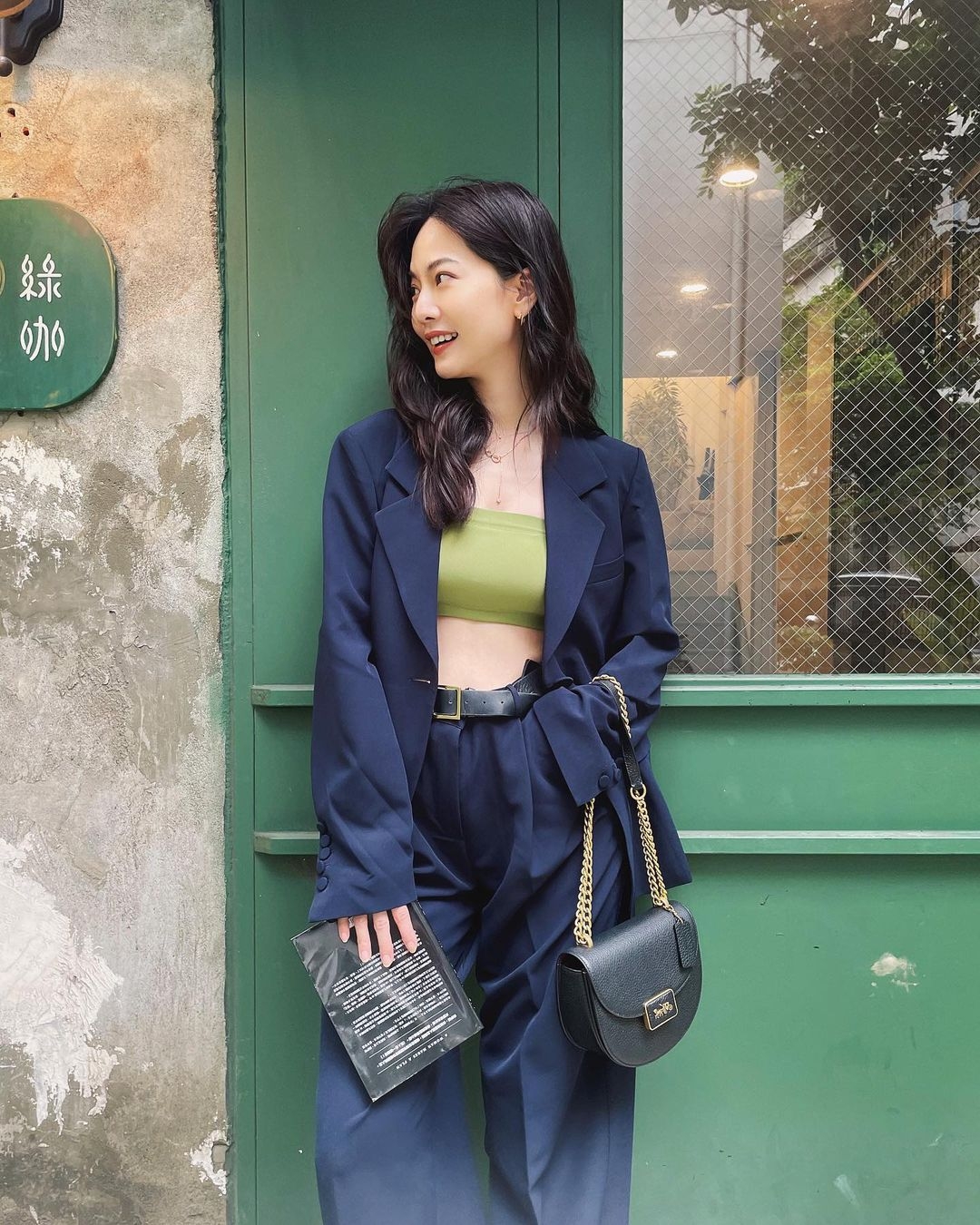 創造視覺重點及協調感是曾之喬穿搭時常運用的技巧。