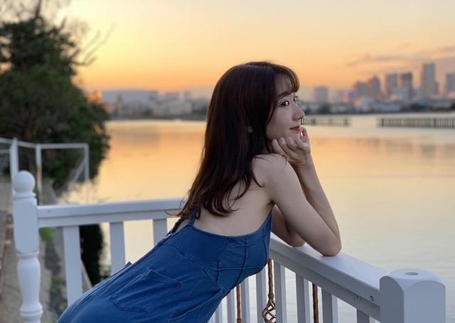 身高165公分的她身材好