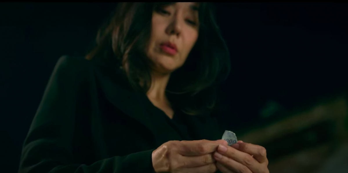 宣祐真口袋的紙鈔碎片