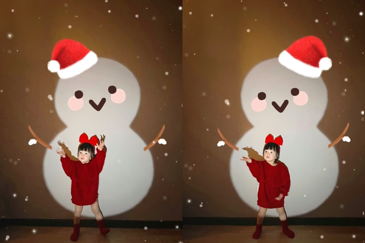 小朋友跟雪人合影也超可愛