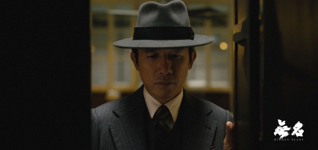 梁朝偉的帽子、西裝,都是舊時上海相當流行的復古單品。