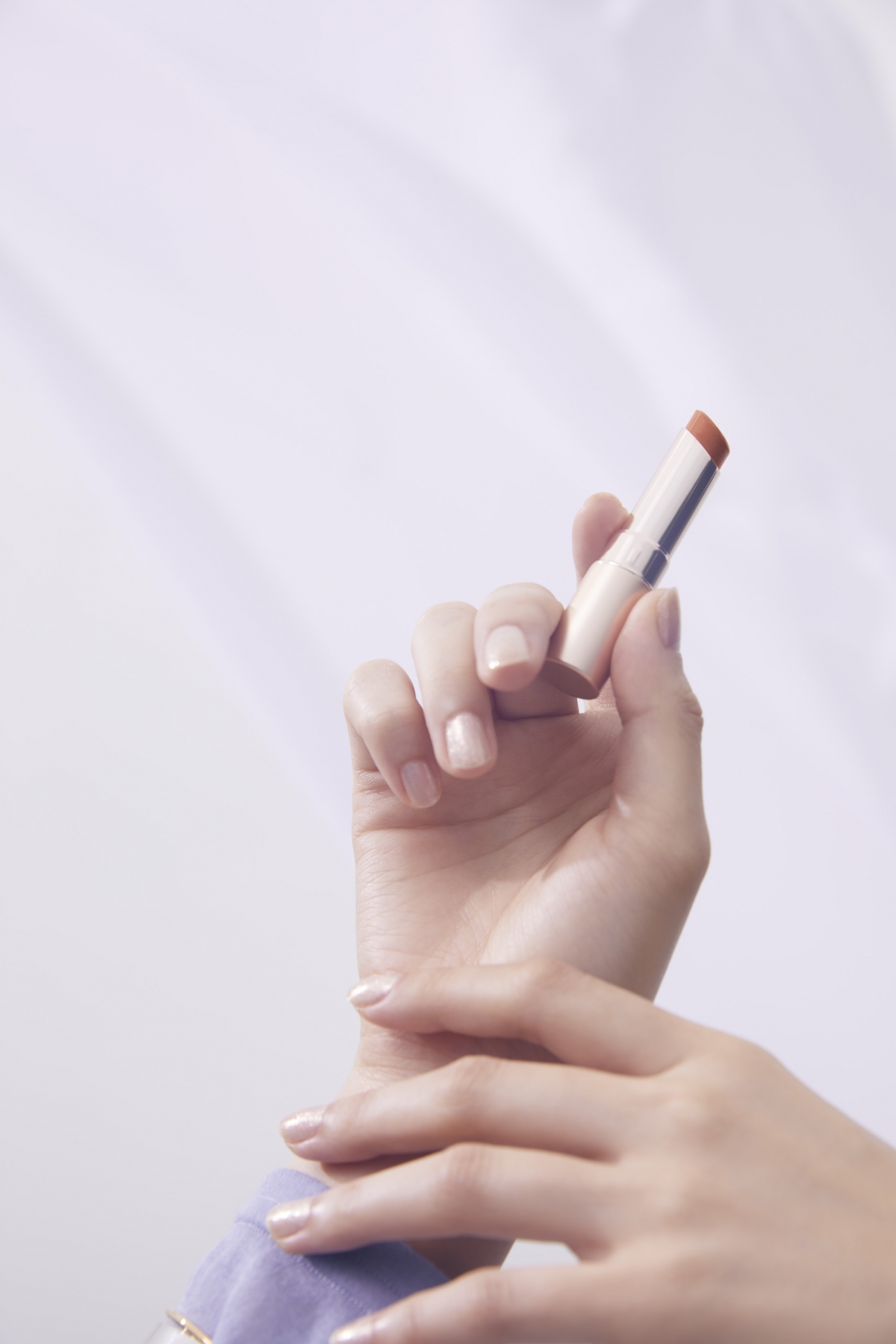 OPERA渲漾水色唇膏#13透褐，NT$380