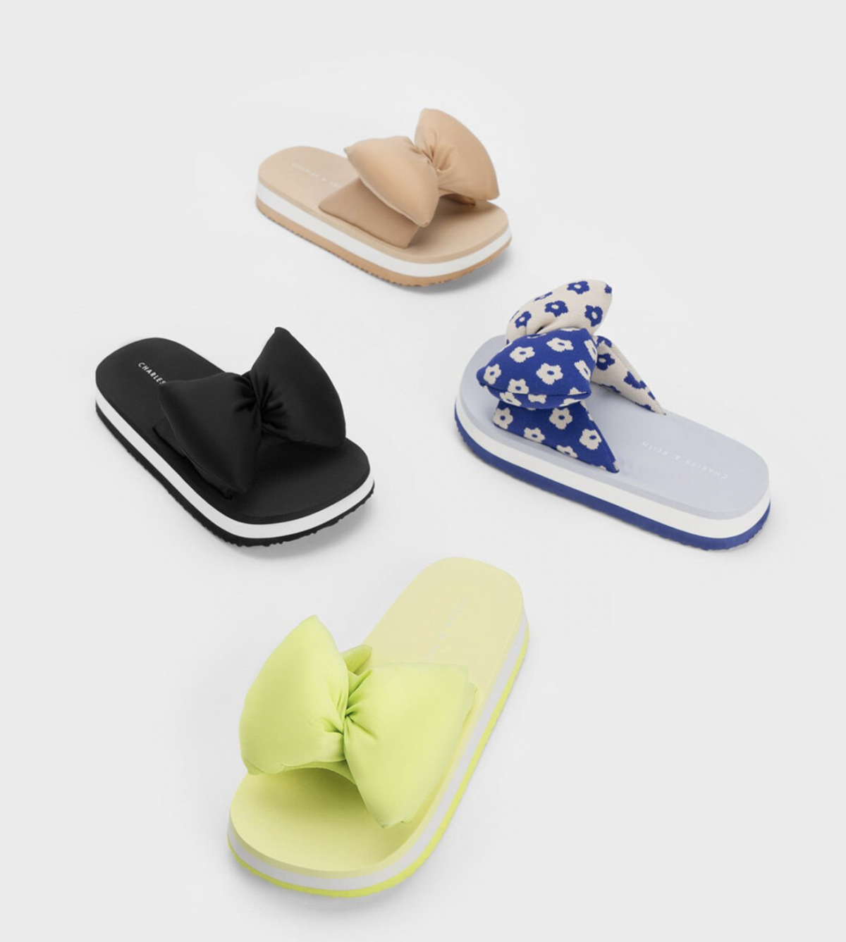 CHARLES & KEITH官網限定 澎澎蝴蝶結厚底拖鞋 NT$ 1,430