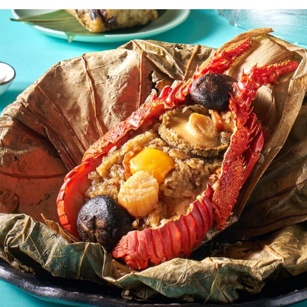 龍王極品鮑魚粽,嚴選半斤東南亞活龍蝦、彈牙鮑魚、鮮美干貝頂餡料豪華地包覆糯米