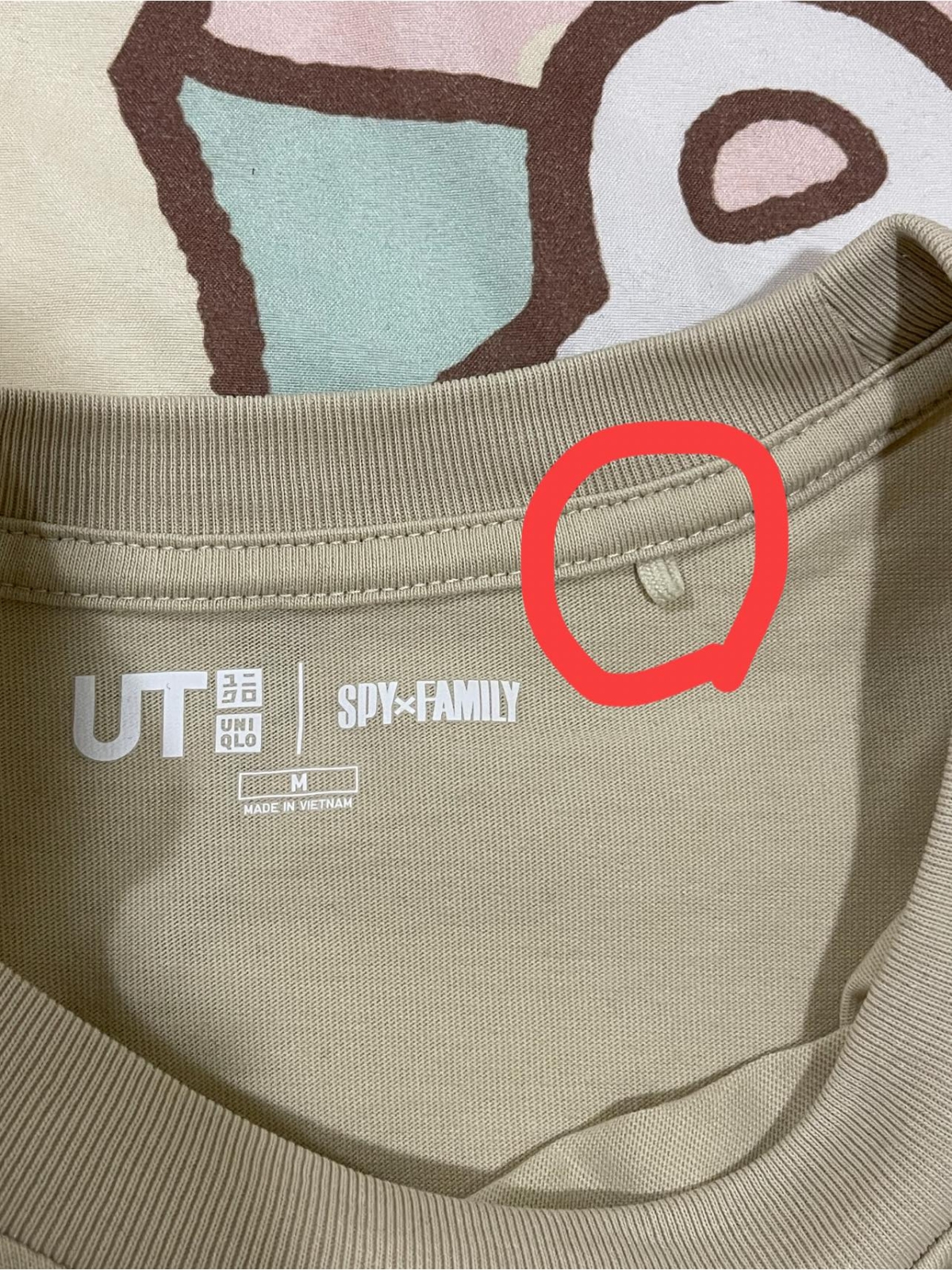 圓領T恤標籤旁的小鉤環要幹嘛?