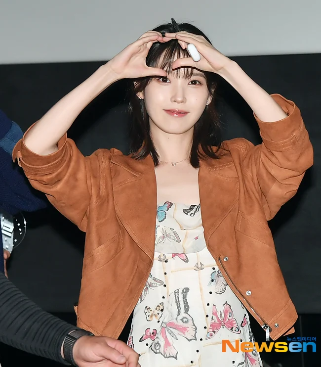 IU當年的制止保安不要兇粉絲的美談再被提起