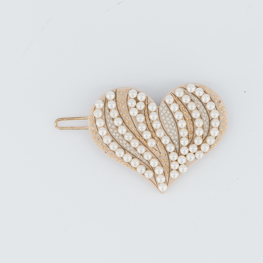 Alexandre de Paris 愛慕之心豆扣夾，NT$15,200