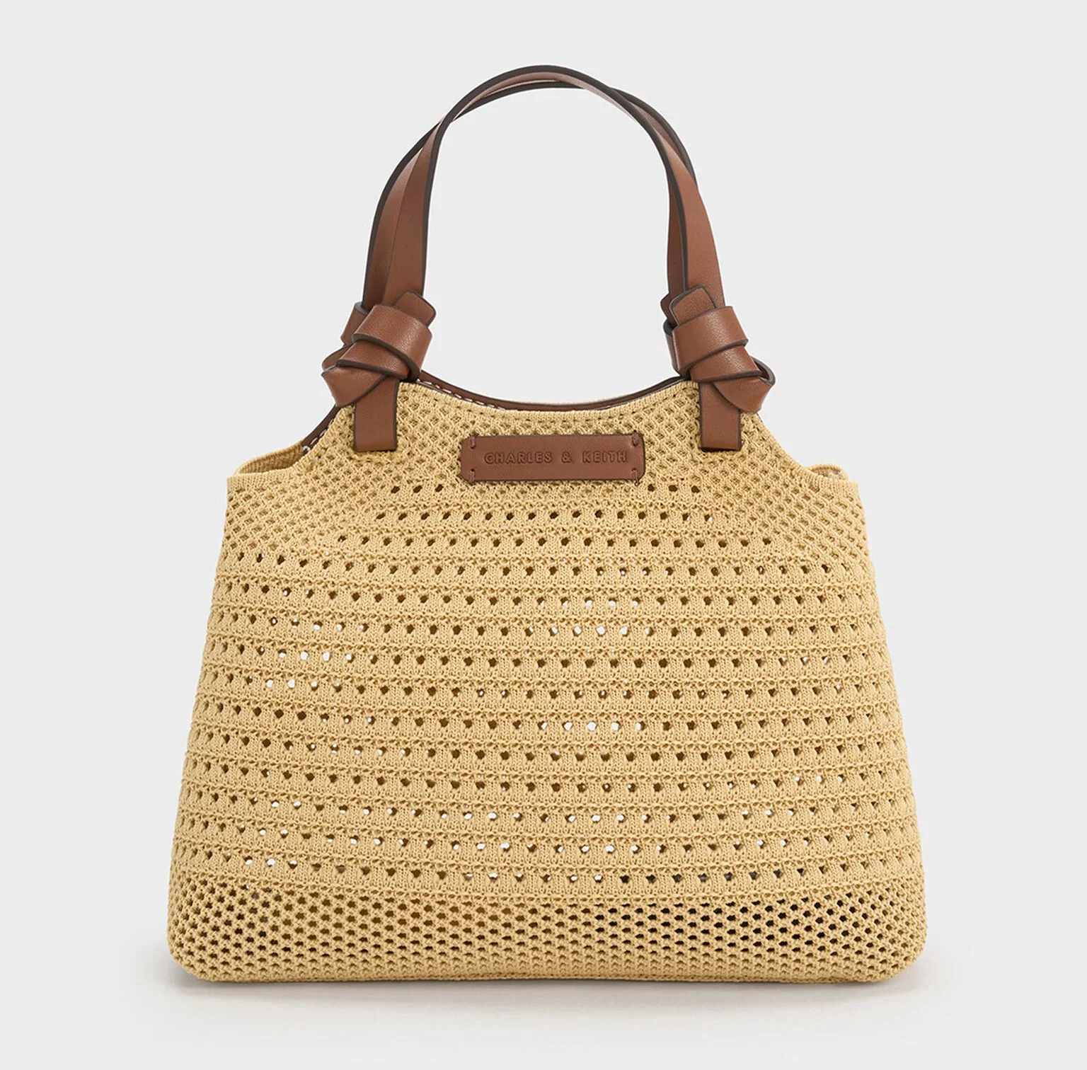 CHARLES & KEITH Ida 編織托特包（米色），NT $2,390
