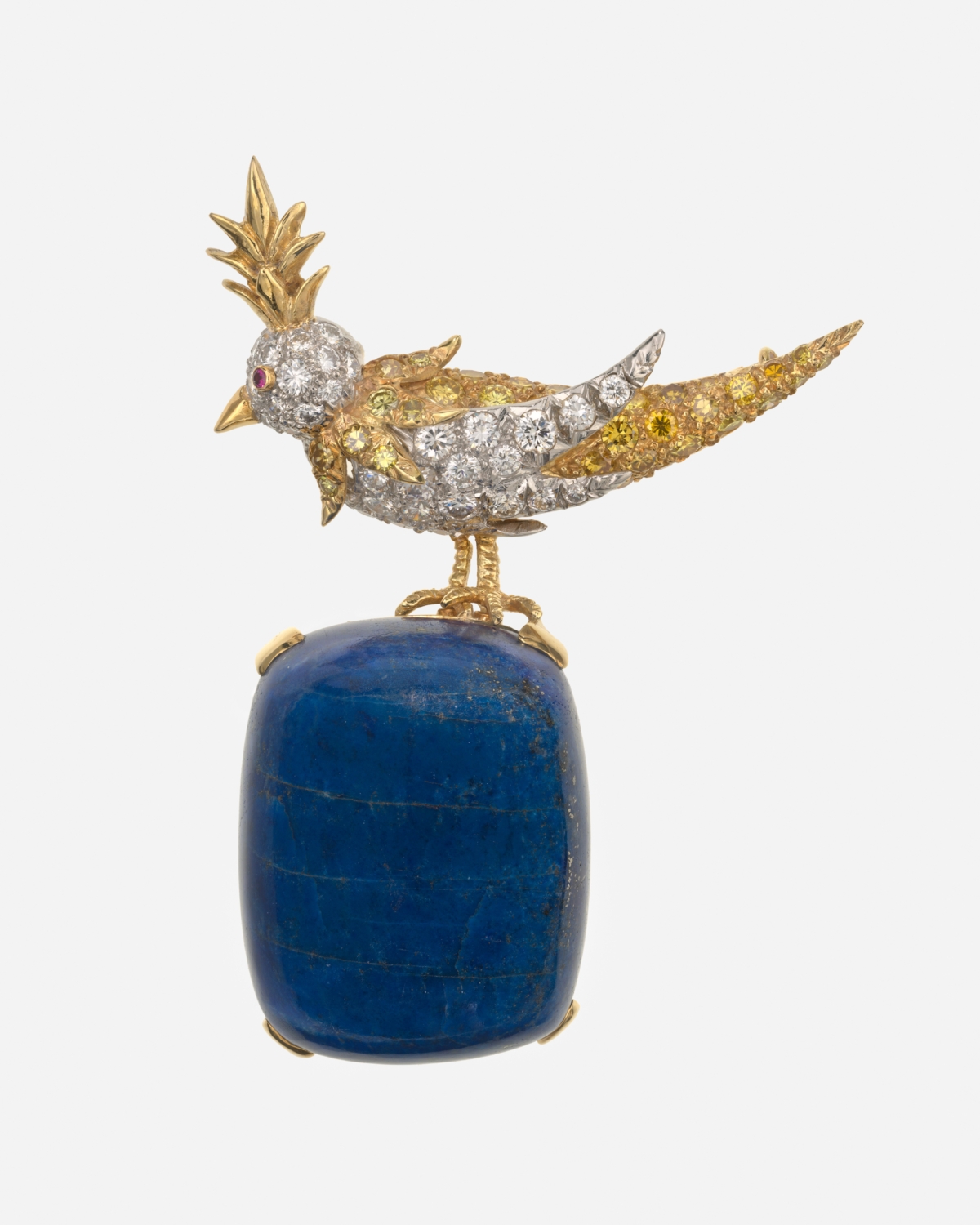 Bird on a Rock 首只胸針_黃金、鉑金、青金石、鑽石、彩鑽，1965年。維吉尼亞美術館